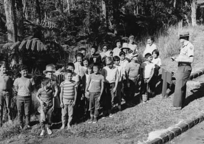Archival photo of a class visit with a park ranger in Volcano.